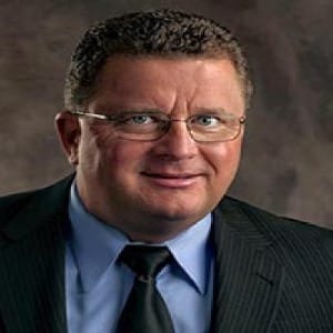 a man wearing a suit and tie