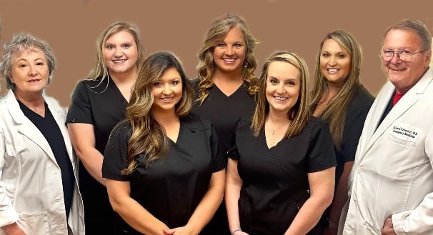 a group of people posing for a photo