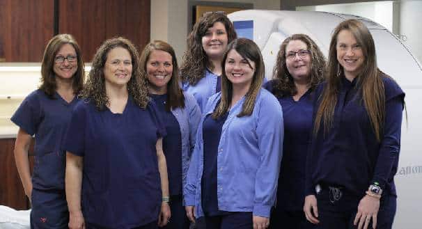 a group of people posing for a photo