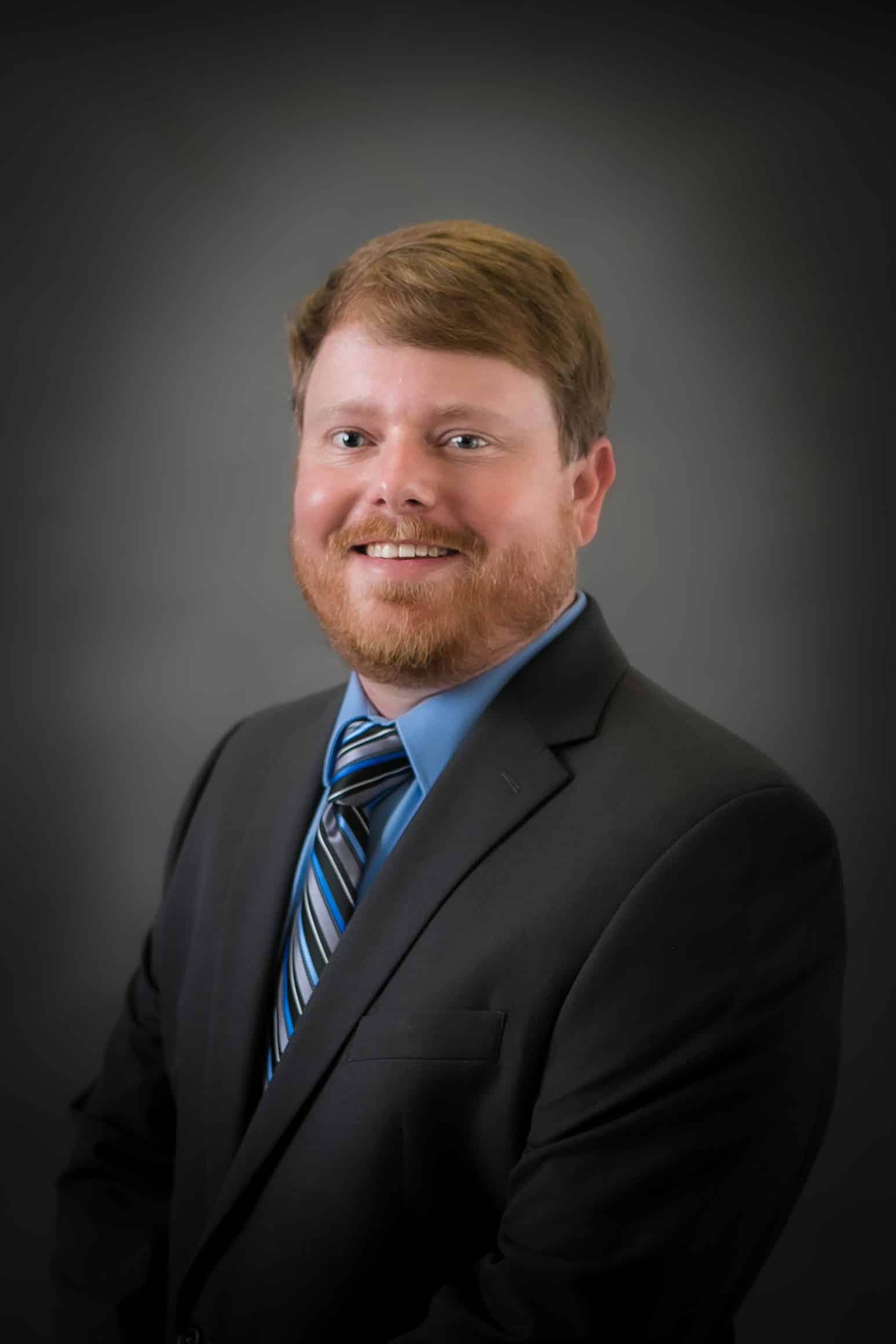 a man wearing a suit and tie