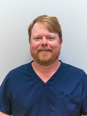 a man in a blue shirt